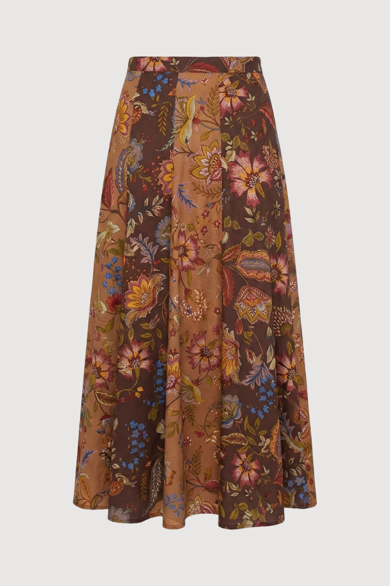 Falda midi con estampado de flores en tonos tierra y corte evasé. 