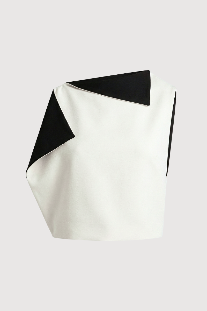 Top sin mangas con piezas multiposición a contraste en cuello y sisa.